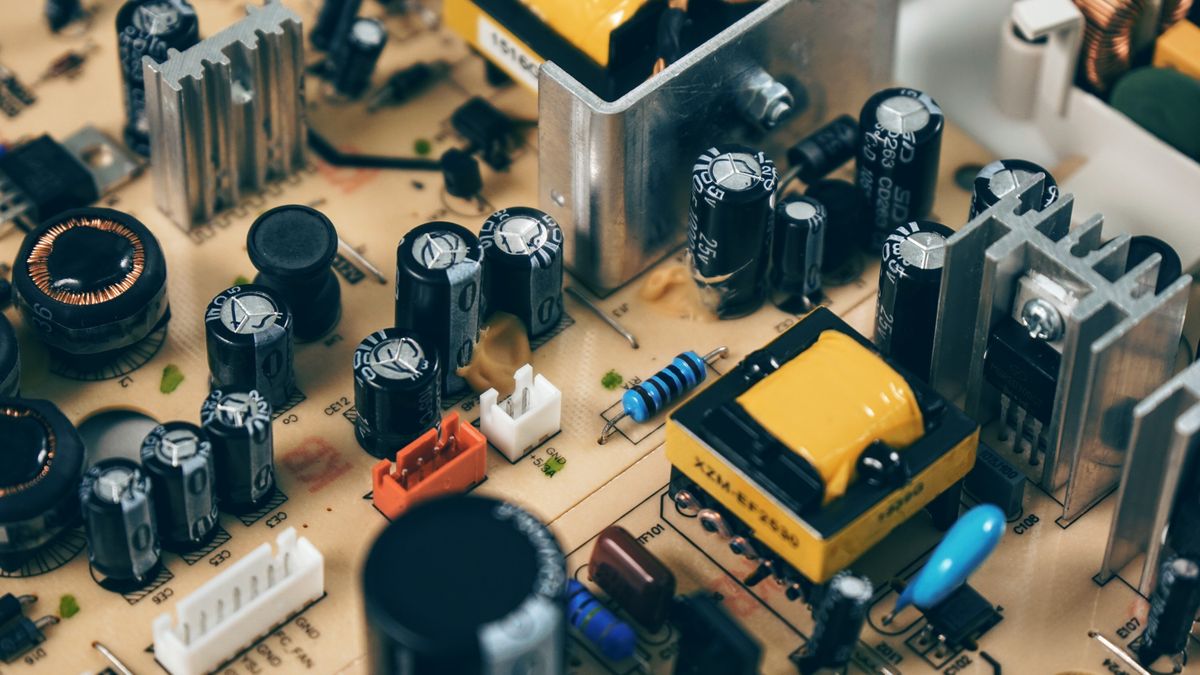 Close-up of a green circuit board with microchips